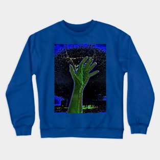 Digital collage and special processing. Hand reaching stars. Monster or great friend. Blue and green, very psychedelic. Crewneck Sweatshirt